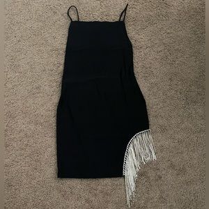 Spaghetti strap rhinestone detail dress.